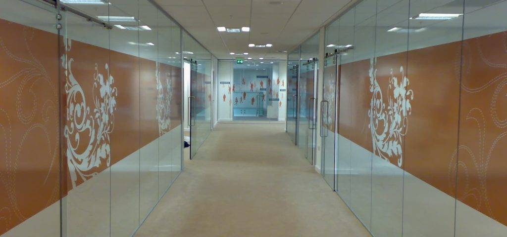 Office Hallway With Glass Frameless Partitions