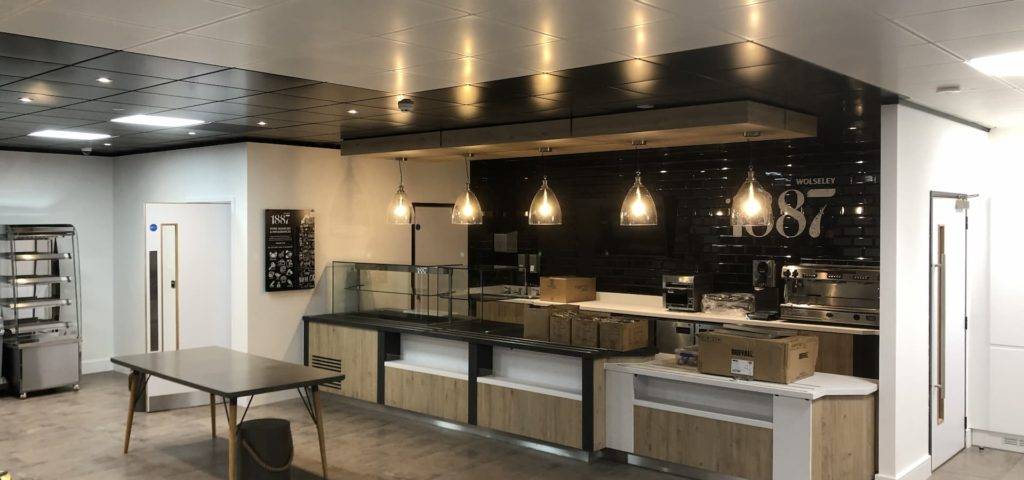 Black and white suspended ceiling in a coffee shop